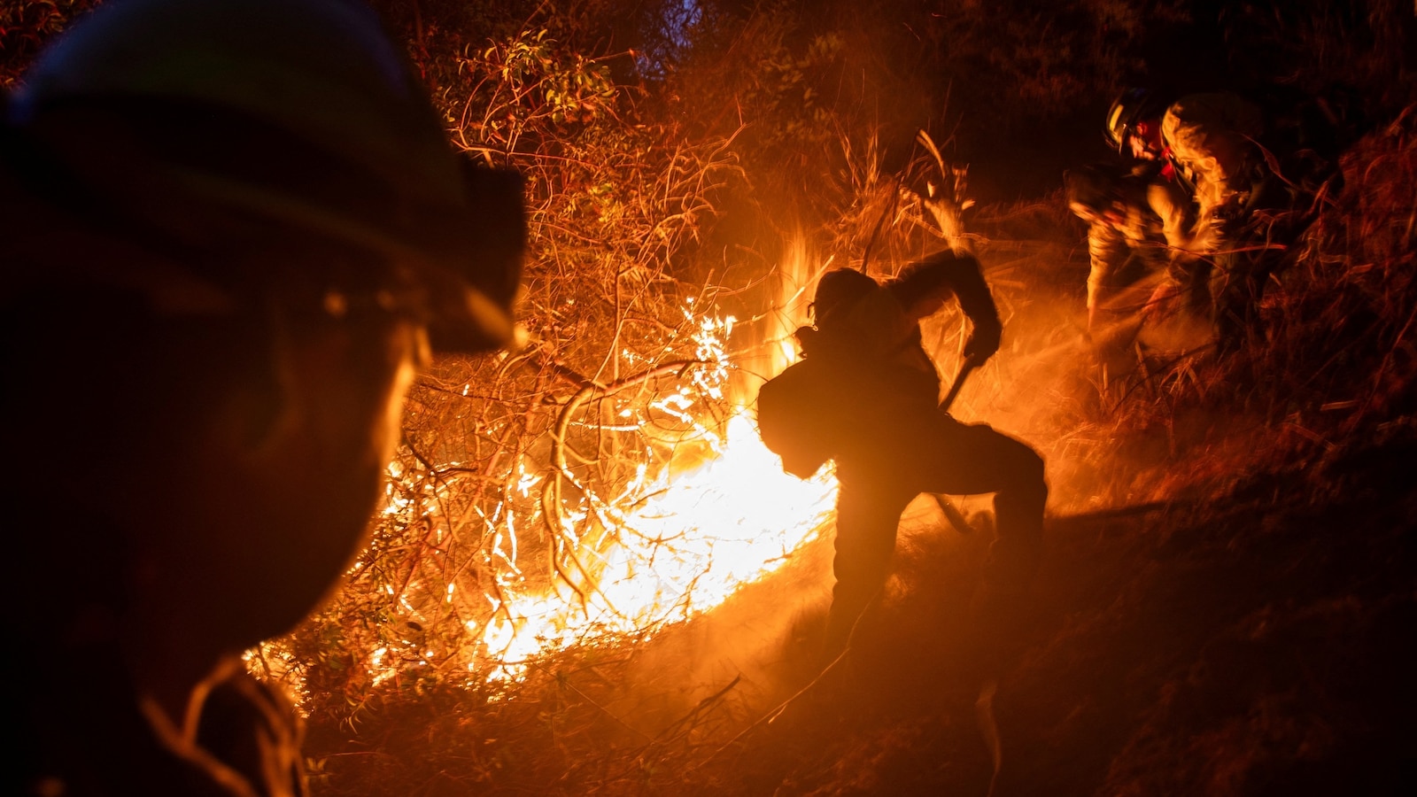 California fires live updates: Fires rage amid warning of ‘dangerous’ weather